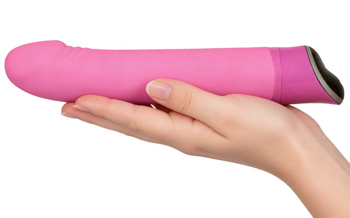 Sweet Smile Happy pink vibrator med let buet skaft og markeret stimulationshoved