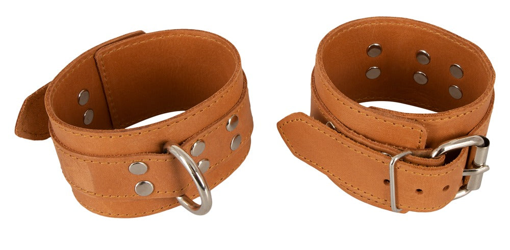 Klassiske læder cuffs med spænder og sølvfarvede D-ringe