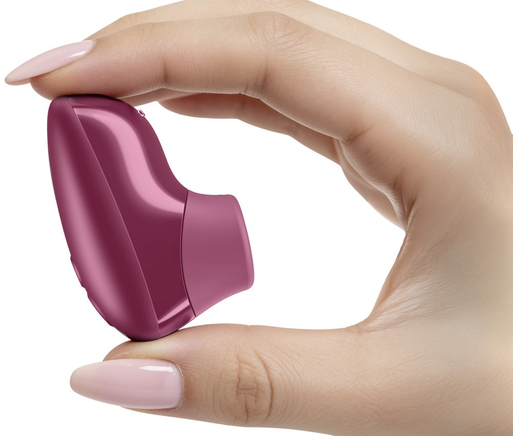 Womanizer Snap mini klitorisstimulator med Pleasure Air og silikonehoved
