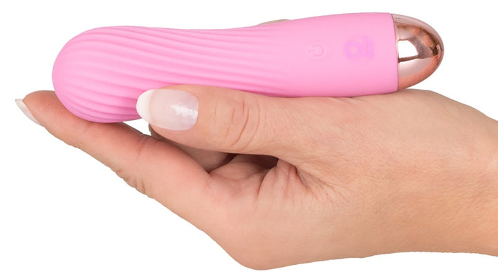 Cuties Pink mini vibrator med rillede detaljer og Soft Touch-overflade