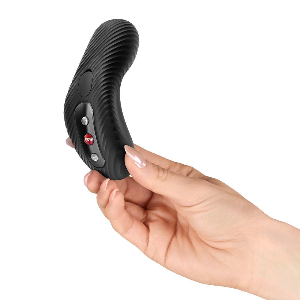 Ergonomisk klitorisvibrator med vibration og tapping-impulser